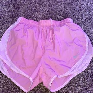 pink nike shorts.